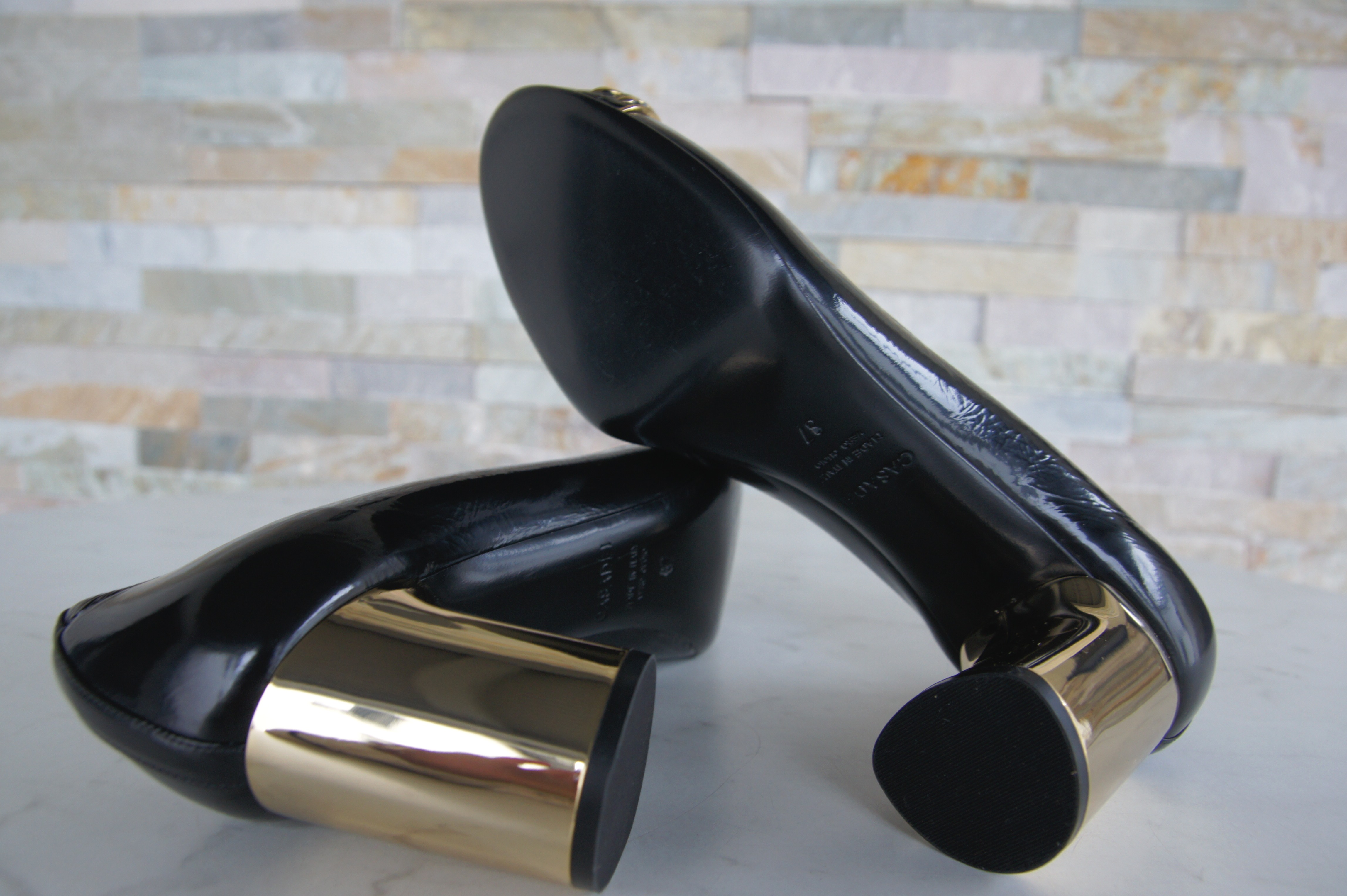 Casadei pumps patent chain black